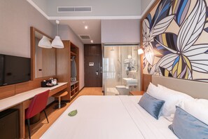 Habitación ejecutiva, 1 cama de matrimonio grande | Ropa de cama hipoalergénica, minibar, caja fuerte y cortinas opacas