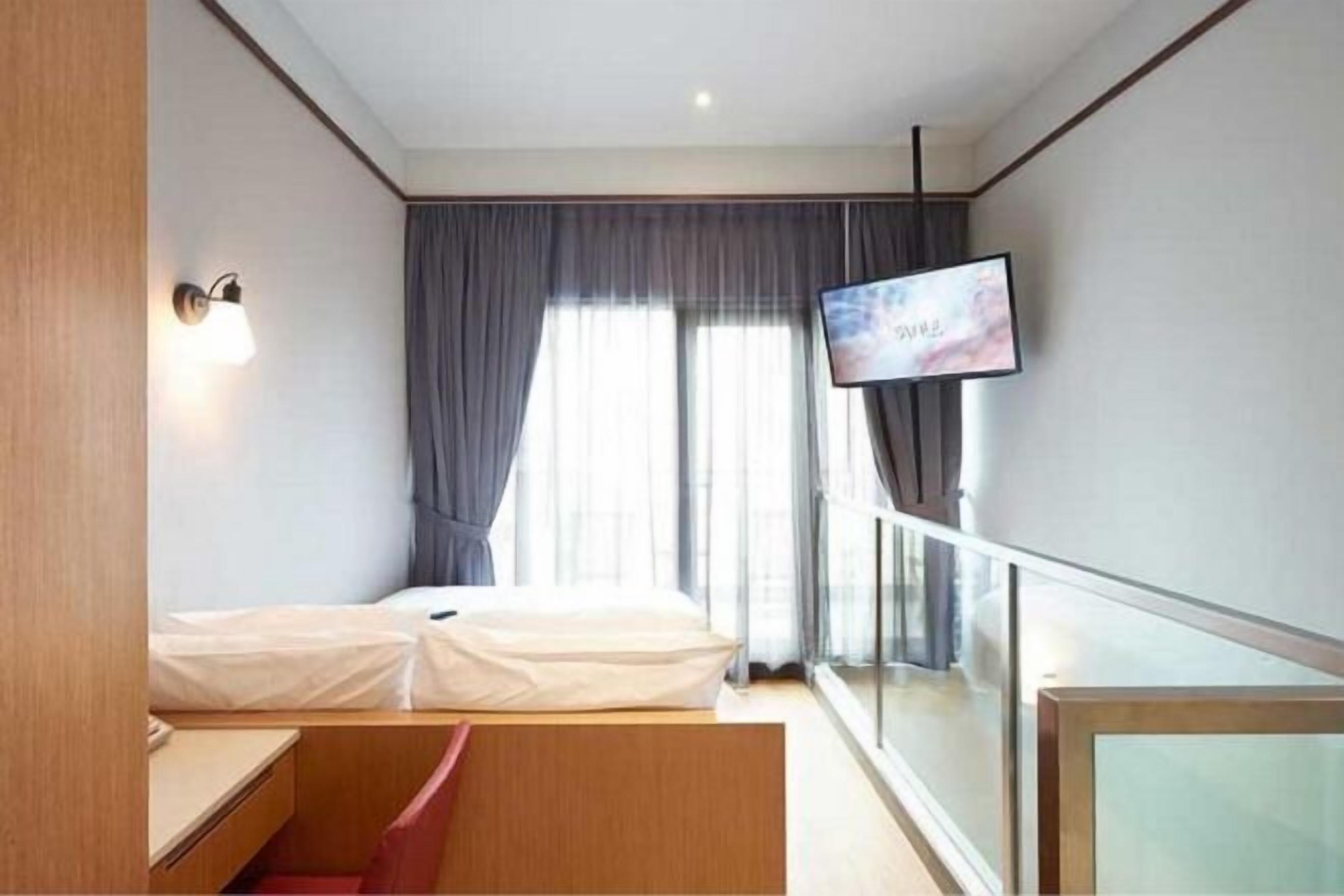 Hypoallergeen beddengoed, een minibar, een kluis op de kamer