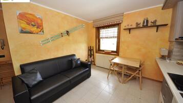 Appartement, 1 chambre | Coin séjour