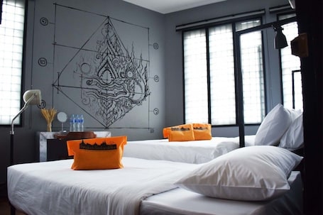 Deluxe Family Boutique Tricycle Room | Premium bedding, minibar, blackout drapes, free WiFi