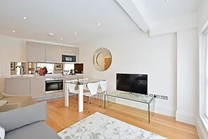 Premium Apartment, 1 Bedroom | Living area | Flat-screen TV