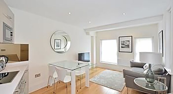 Premium Apartment, 1 Bedroom | Living area | Flat-screen TV