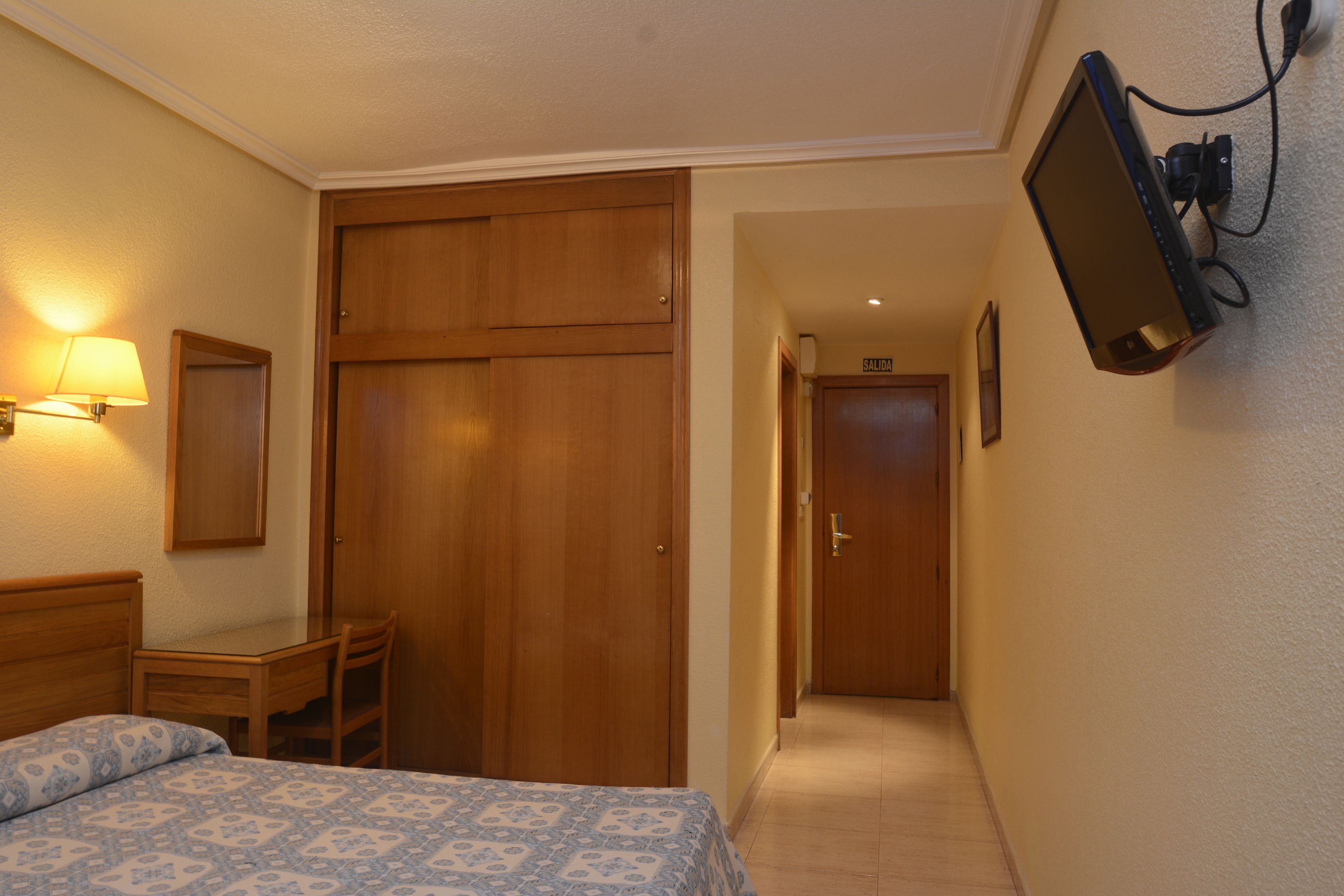 desk, blackout curtains, iron/ironing board, free cots/infant beds