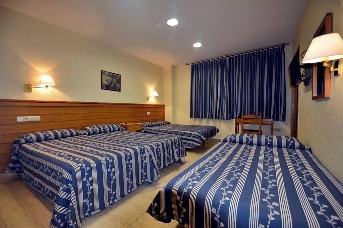 Desk, blackout curtains, iron/ironing board (on request)
