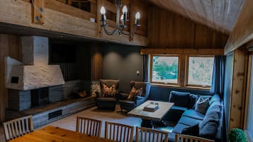 Apartment 10 persons with Loft (excluding linen & towels) | Living area | Flat-screen TV, heated floors