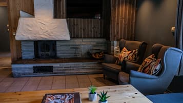 Apartment 10 persons with Loft (excluding linen & towels) | Living area | Flat-screen TV, heated floors