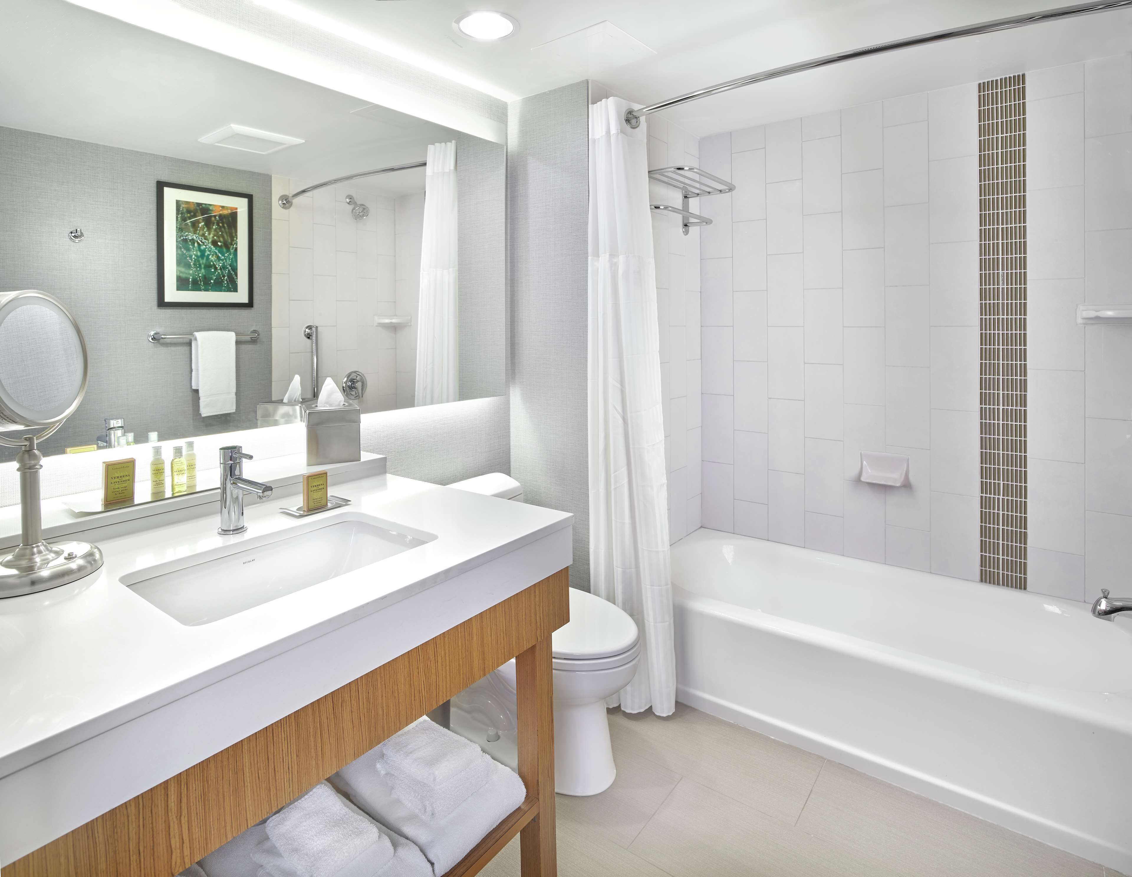 room, 2 queen beds | bathroom | shower, free toiletries, hair dryer, towels