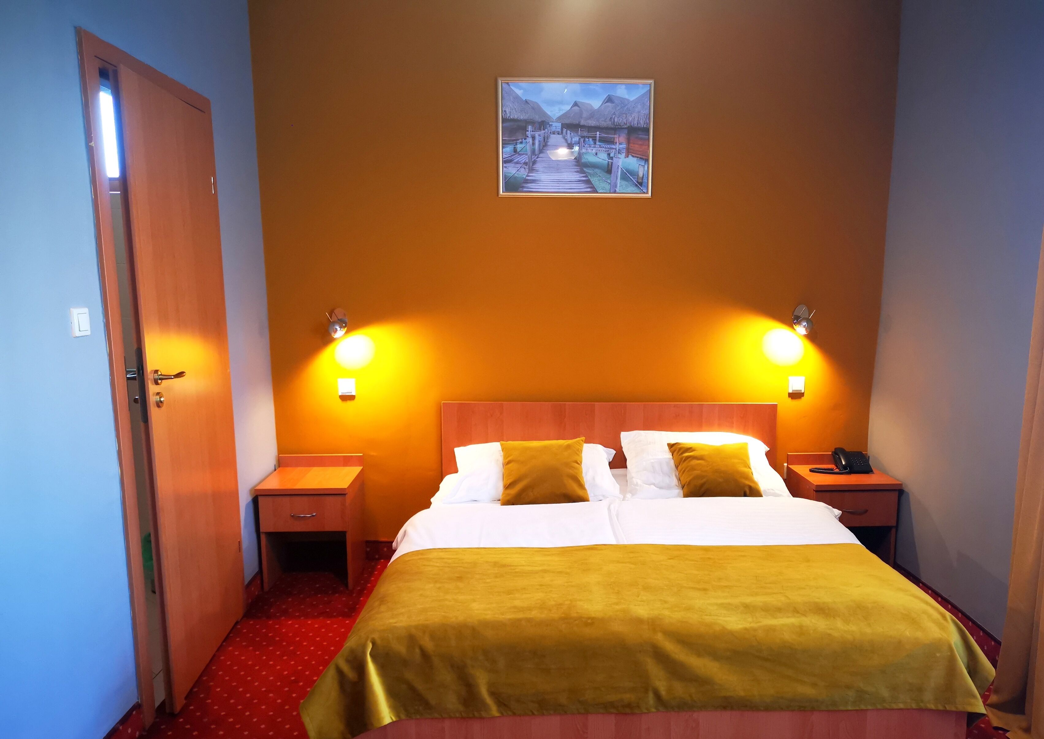 standard double room | living area | flat-screen tv