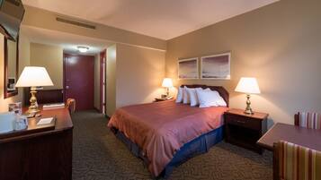 Habitación Deluxe, 1 cama Queen size | Escritorio, wifi gratis y ropa de cama