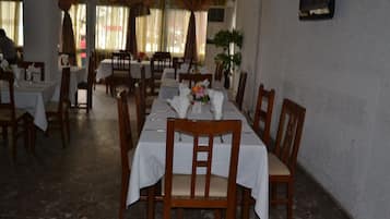 Breakfast, lunch, dinner served; local cuisine