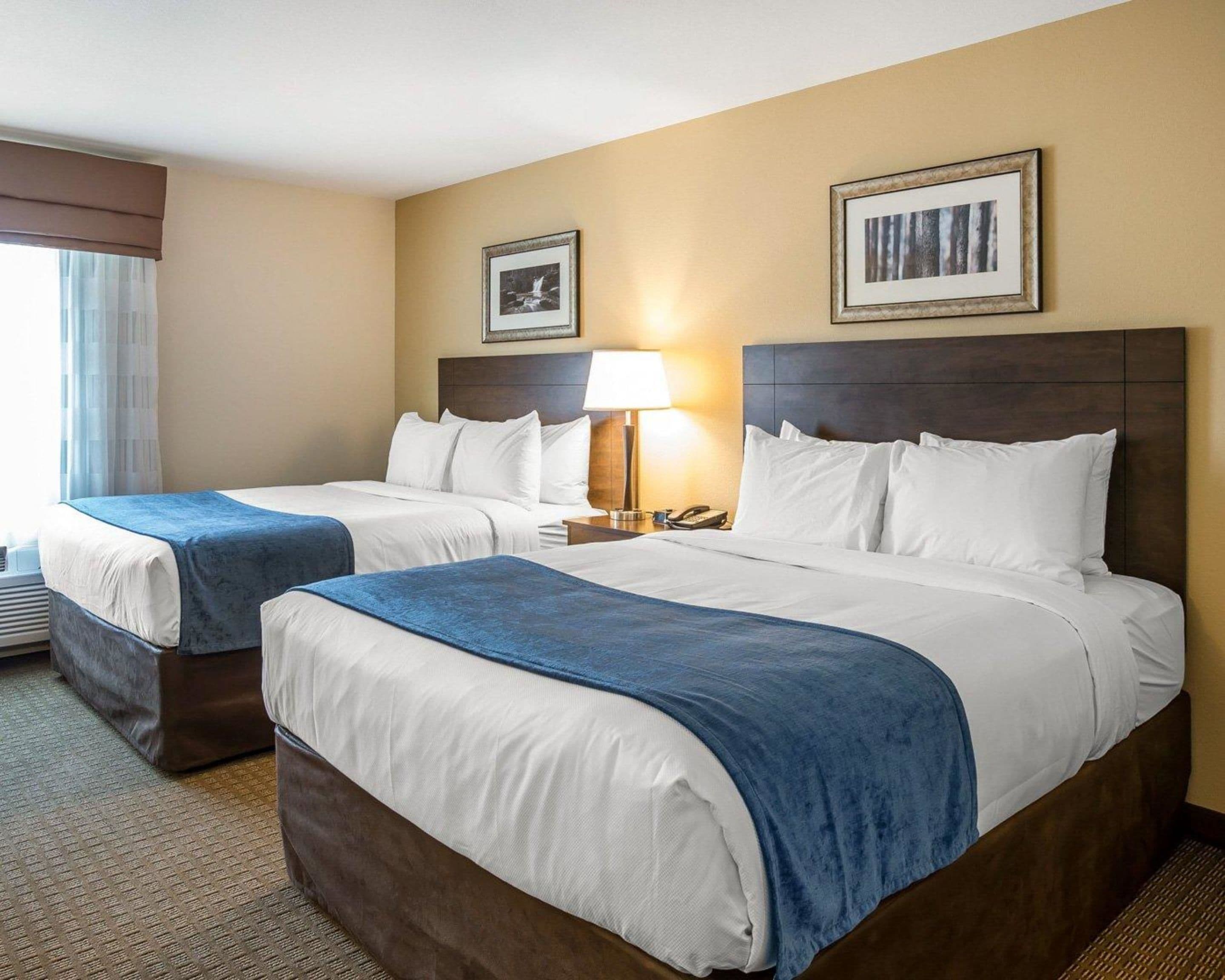 desk, laptop workspace, blackout curtains, iron/ironing board