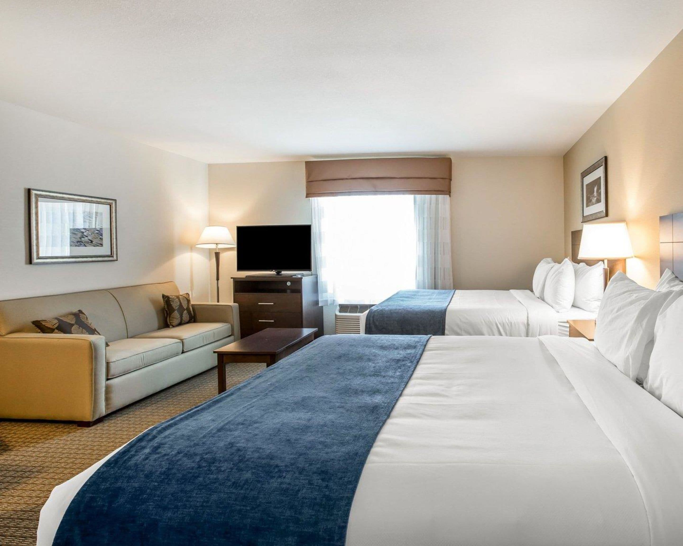 suite, multiple beds, non smoking | desk, laptop workspace, blackout curtains, iron/ironing board