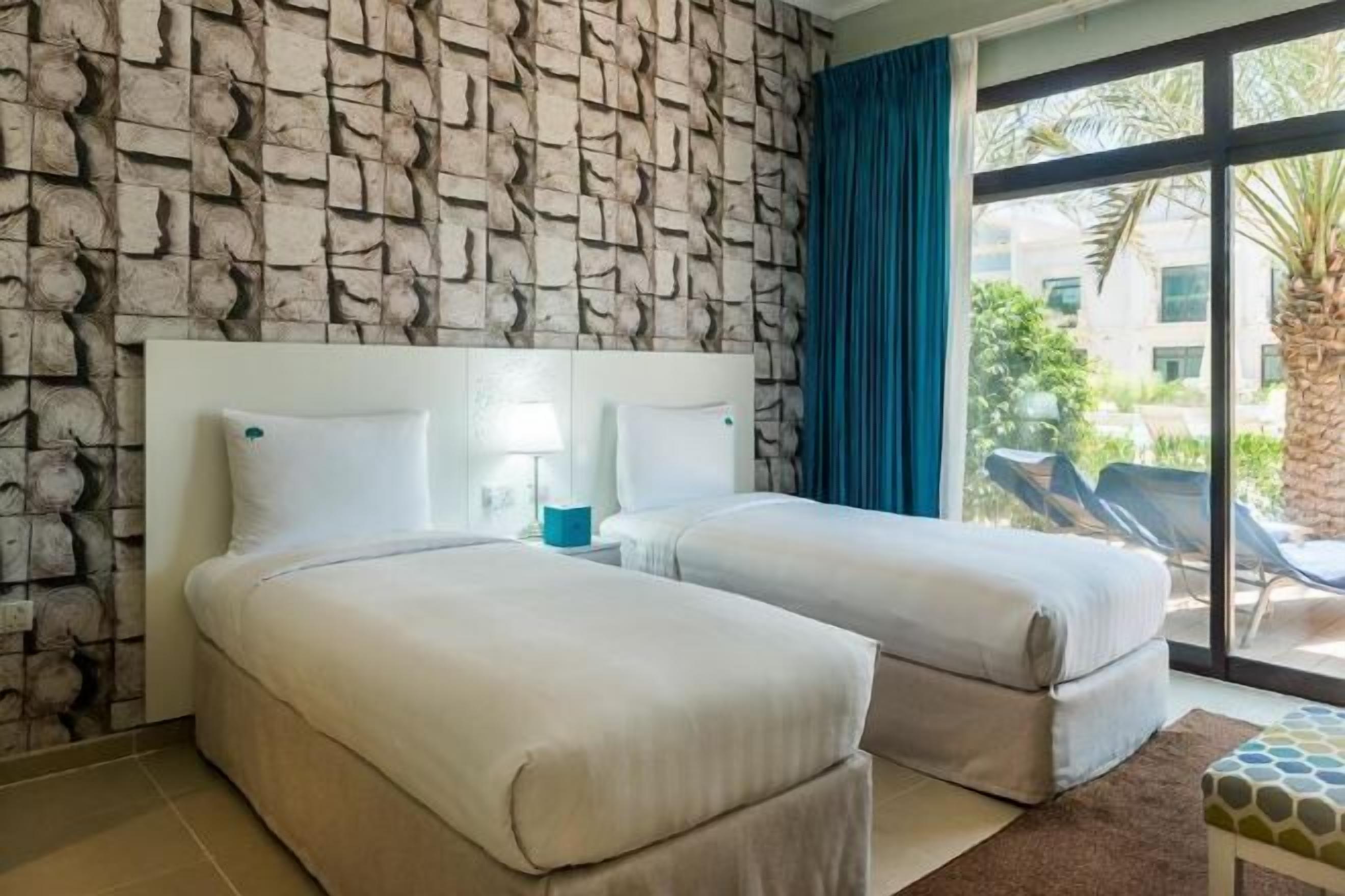 ตู้นิรภัยในห้องพัก, พื้นที่ทำงานแบบใช้แล็ปท็อป, Wi-Fi ฟรี, ผ้าปูที่นอน