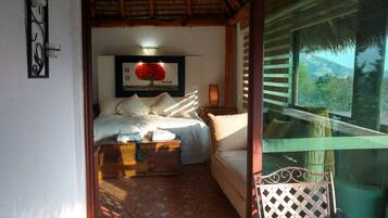 Deluxe Suite, 1 King Bed | In-room safe, individually decorated, iron/ironing board, rollaway beds