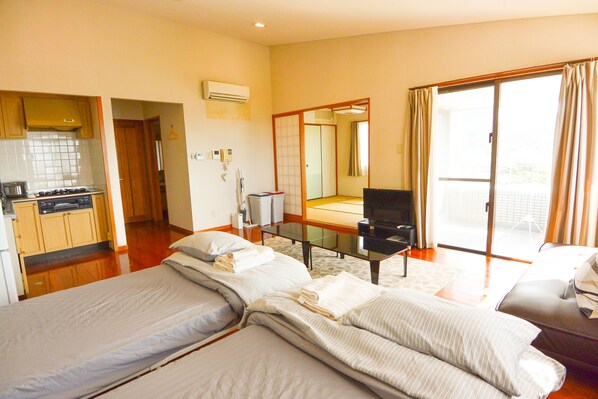 Family Apartment, Multiple Beds, Ocean View | Living area