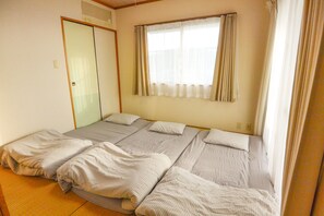 Family Apartment, Multiple Beds, Ocean View | Desk, rollaway beds, free WiFi - Resort Mansion Sea Zone (Onna)