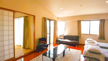 Family Apartment, Multiple Beds, Ocean View | Living area | LCD TV