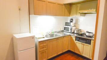 Family Apartment, Multiple Beds, Ocean View | Private kitchen | Full-size fridge, microwave, stovetop, coffee/tea maker