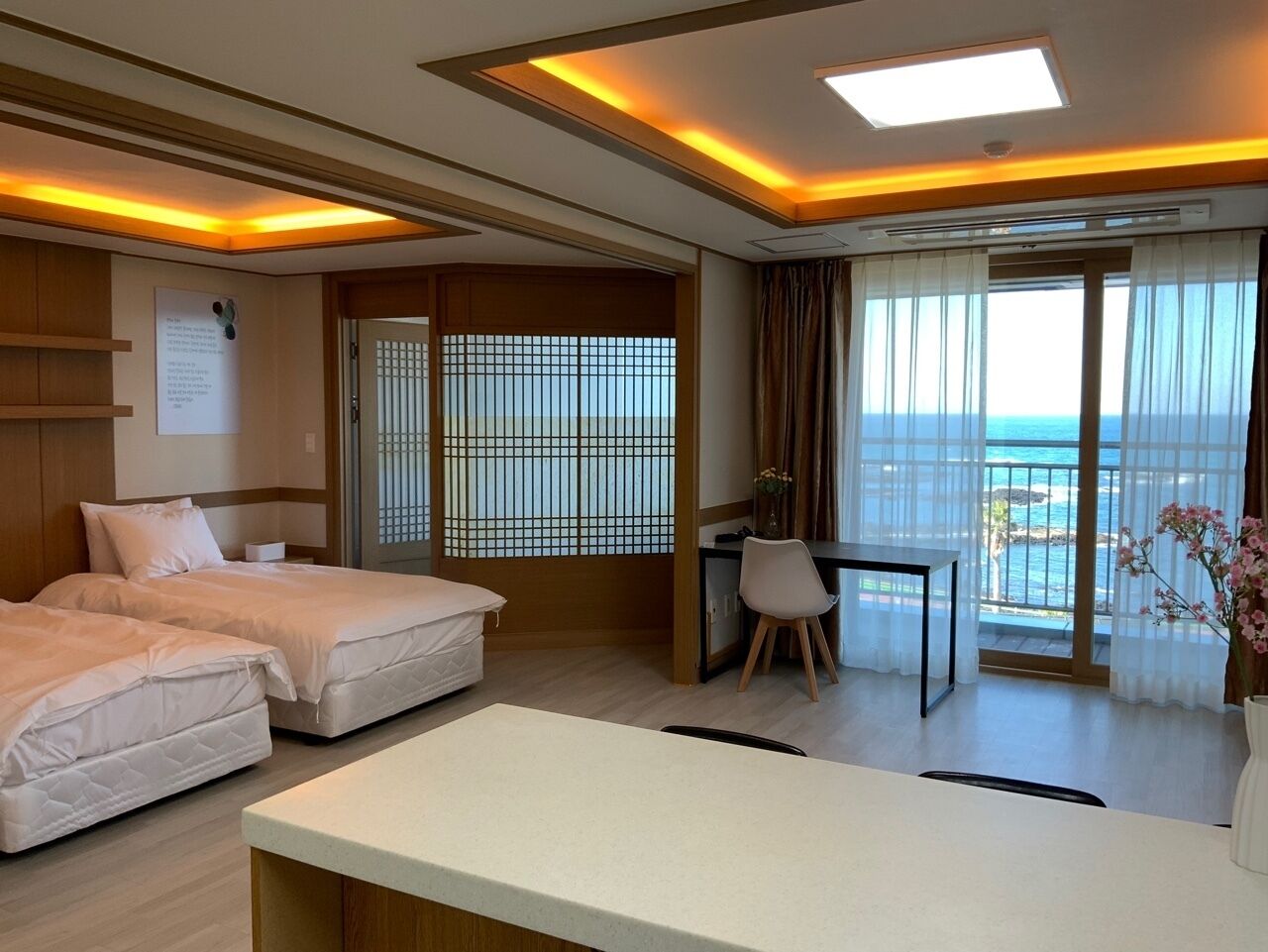 deluxe twin room for 2 to 4 guests / meditation program included | living area | led tv, heated floors