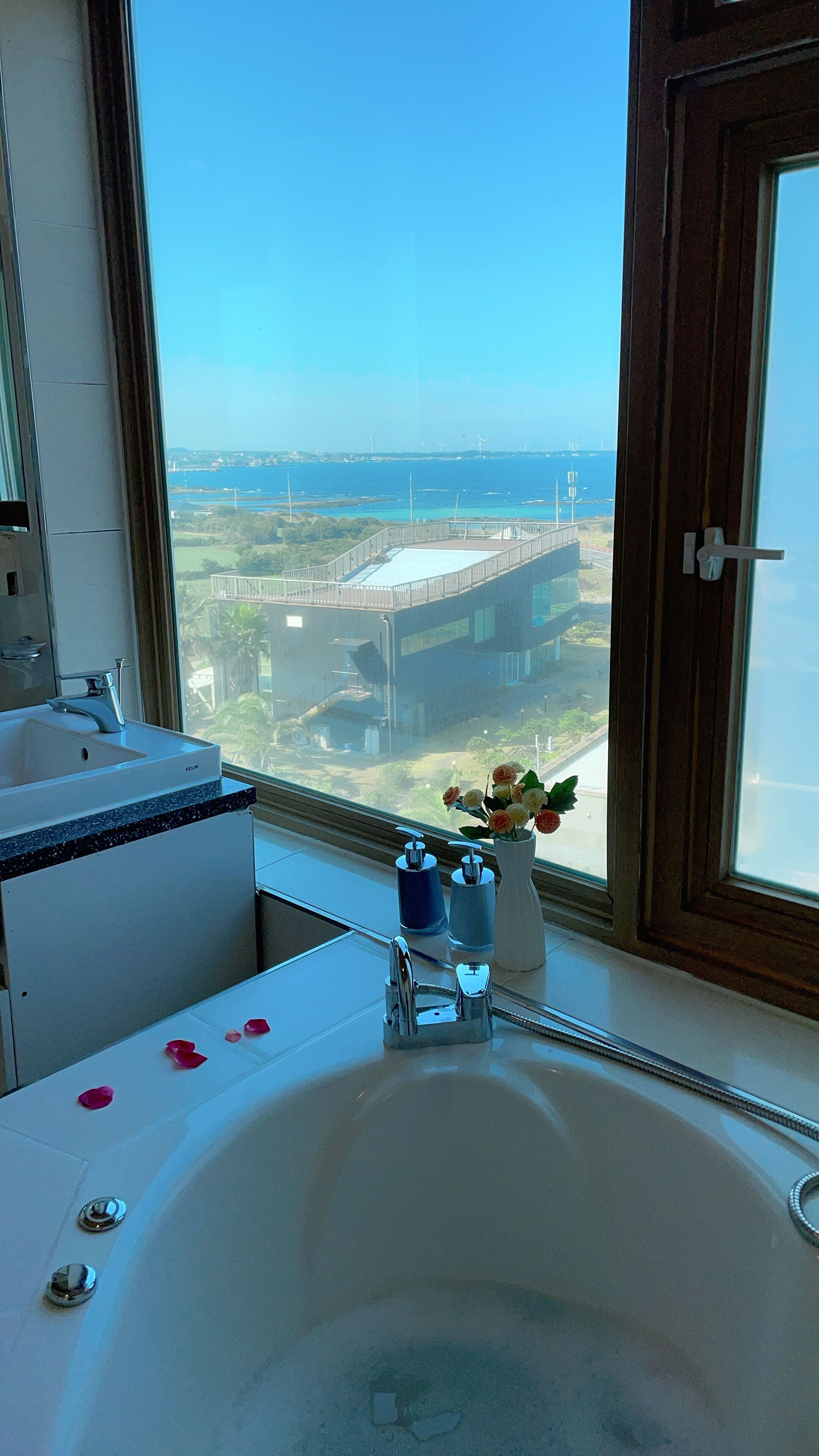 deluxe twin room for 2 to 4 guests / meditation program included | bathroom | hair dryer, bidet, towels, shampoo