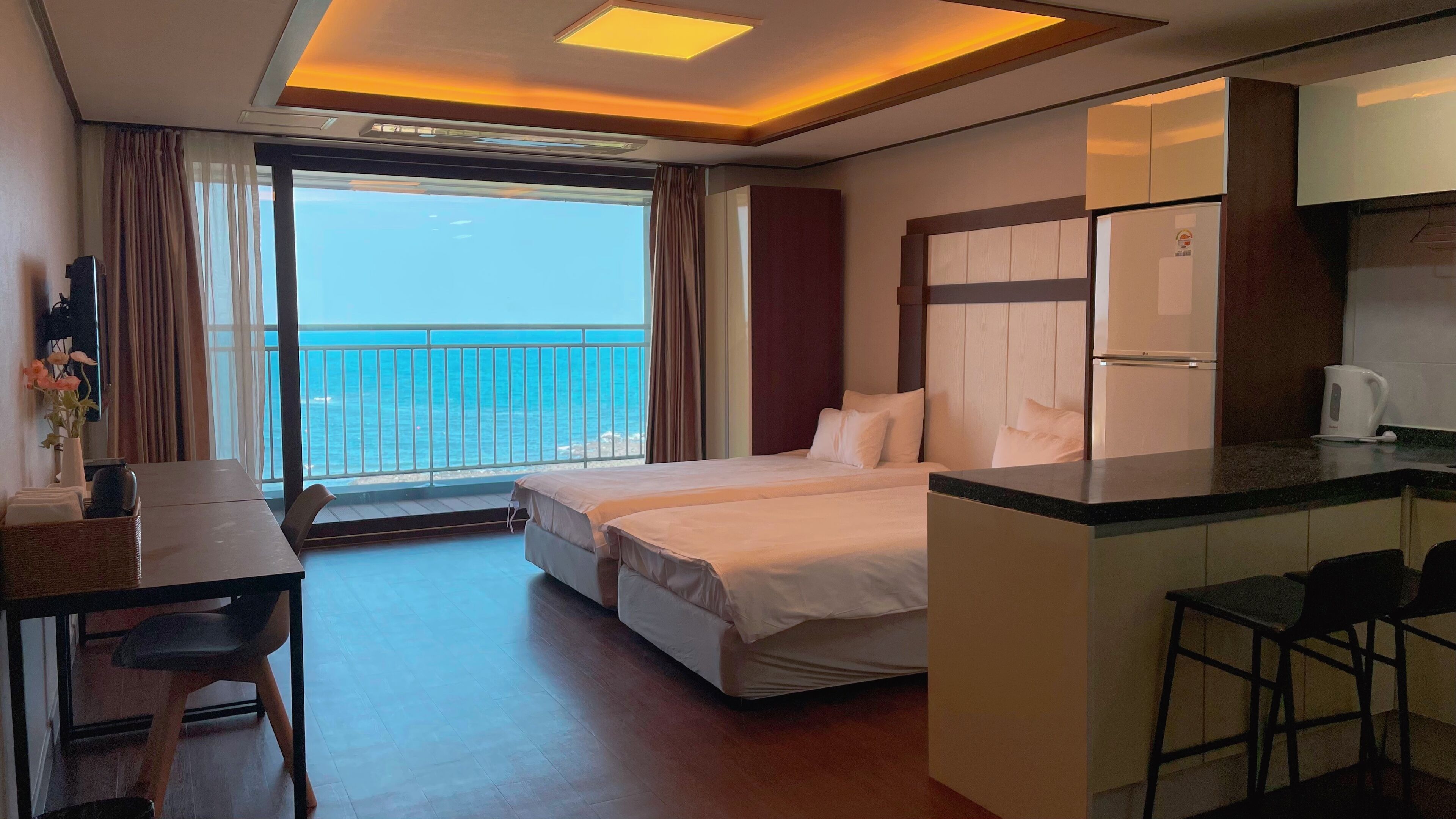 twin room for 2 | down duvets, desk, laptop workspace, blackout curtains