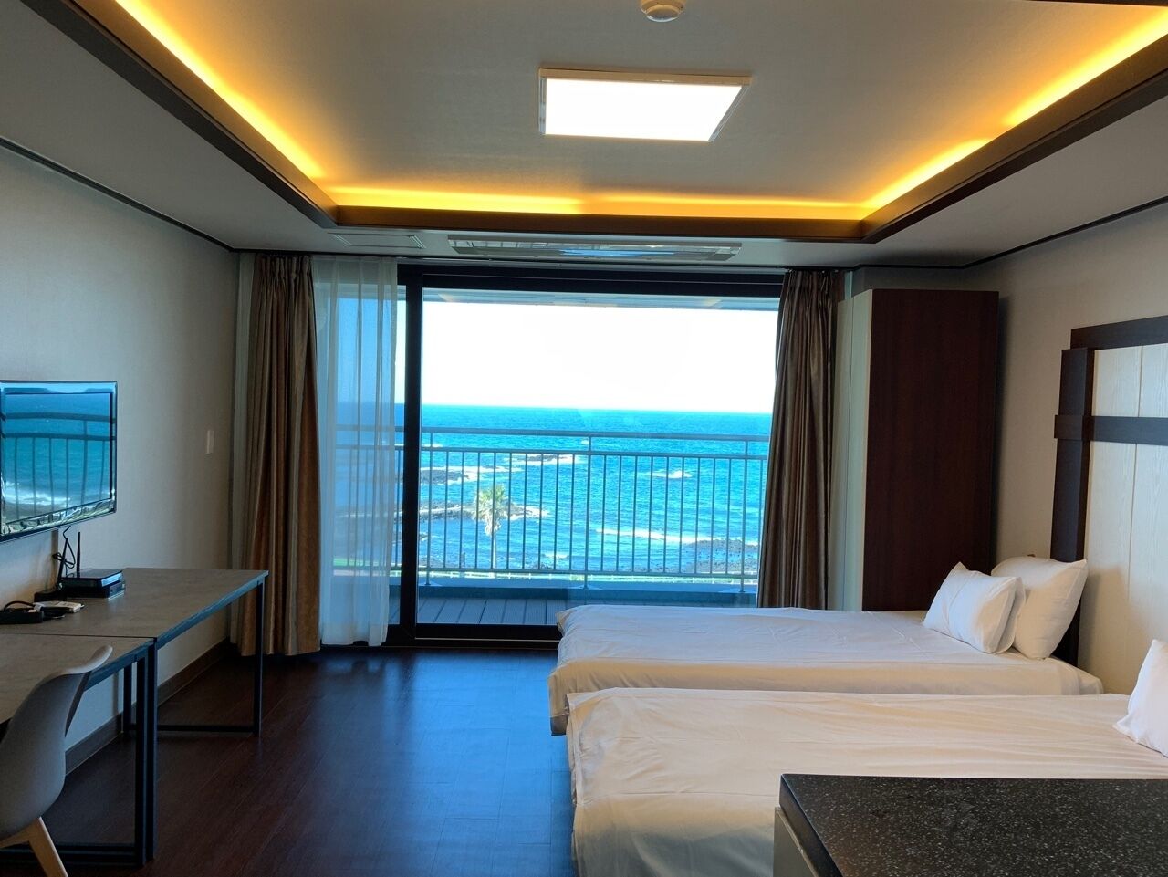 twin room for 2 | down duvets, desk, laptop workspace, blackout curtains