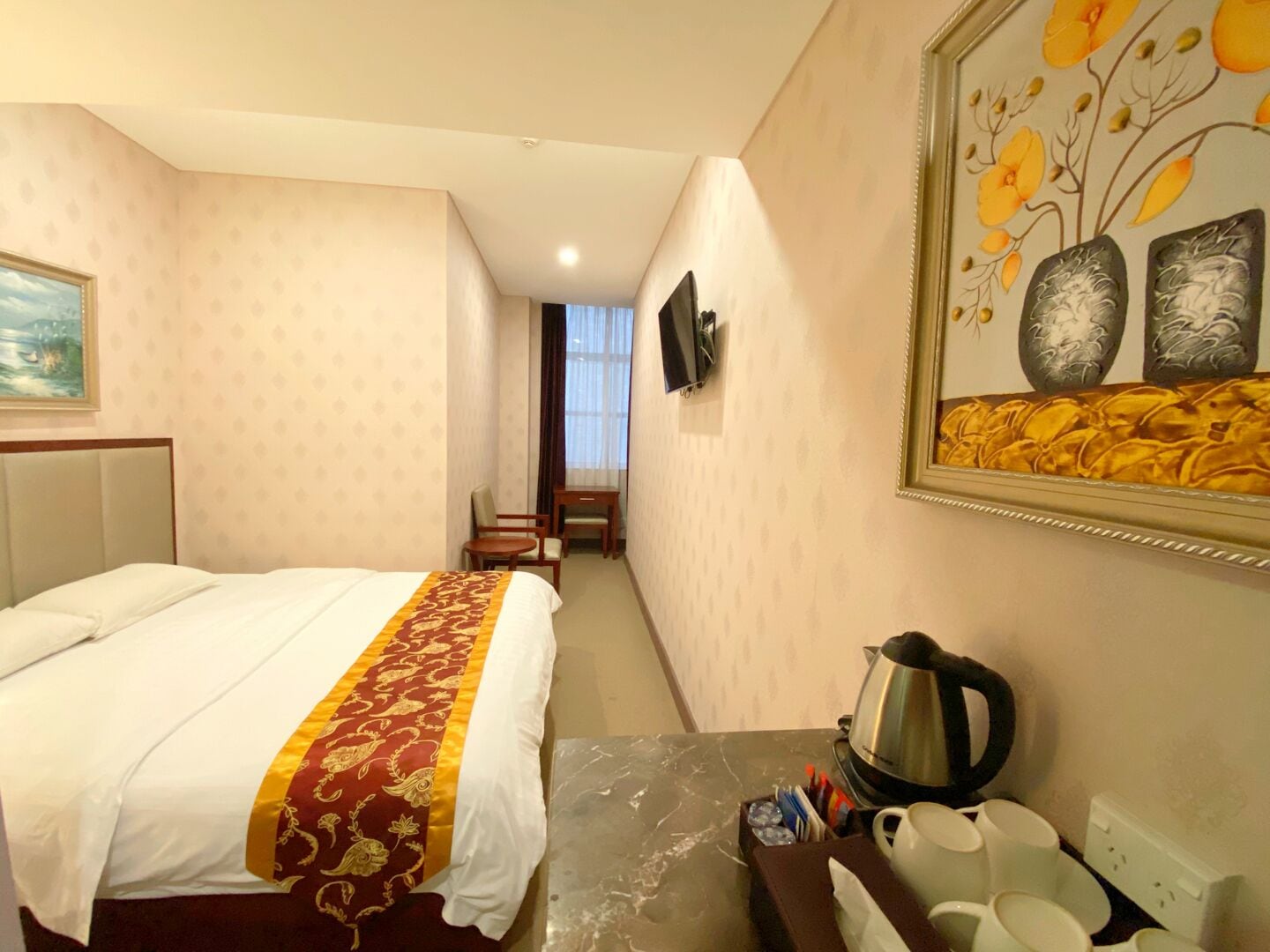 economy room, 1 queen bed | in-room safe, desk, soundproofing, iron/ironing board