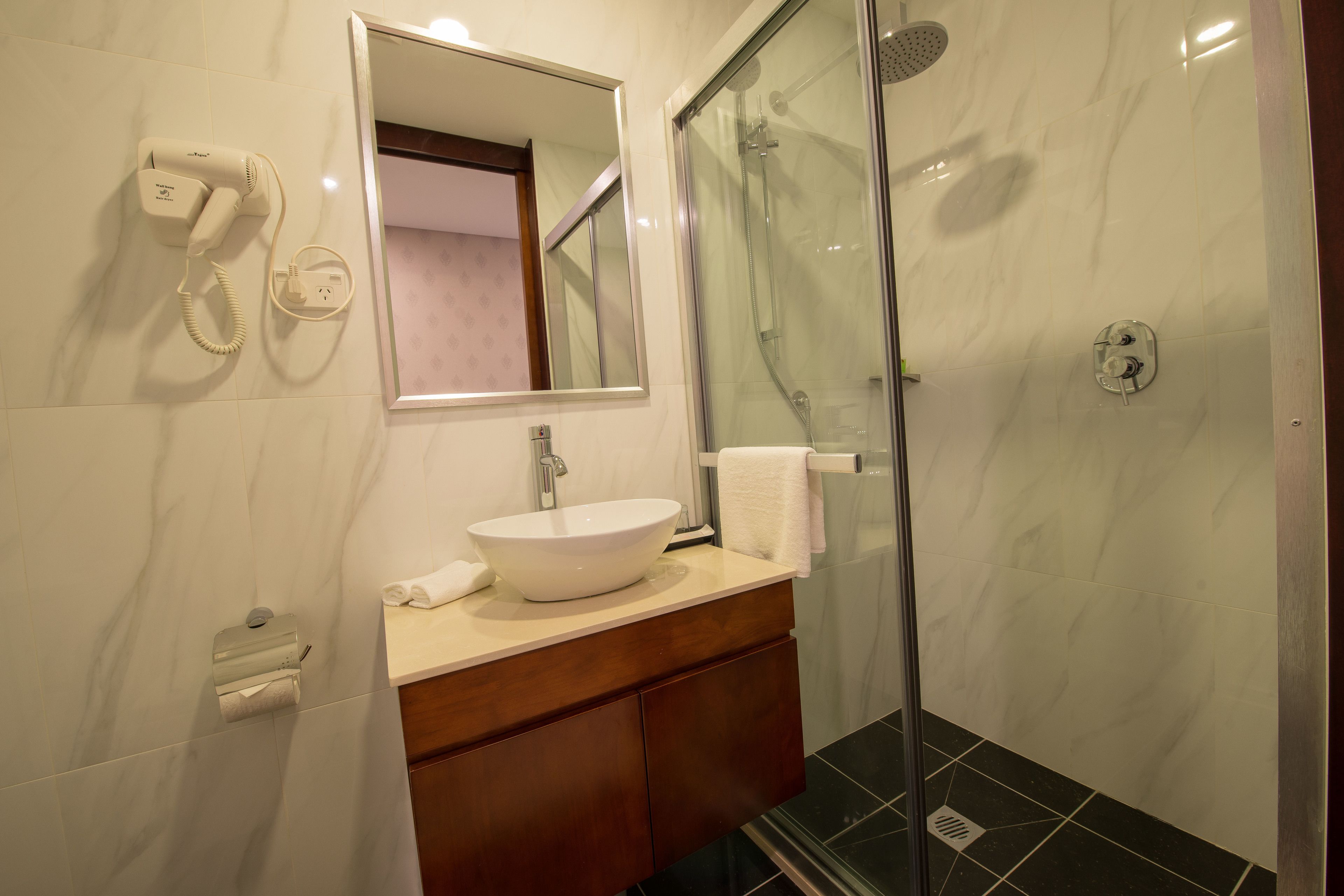 compact single | bathroom | shower, free toiletries, hair dryer, slippers