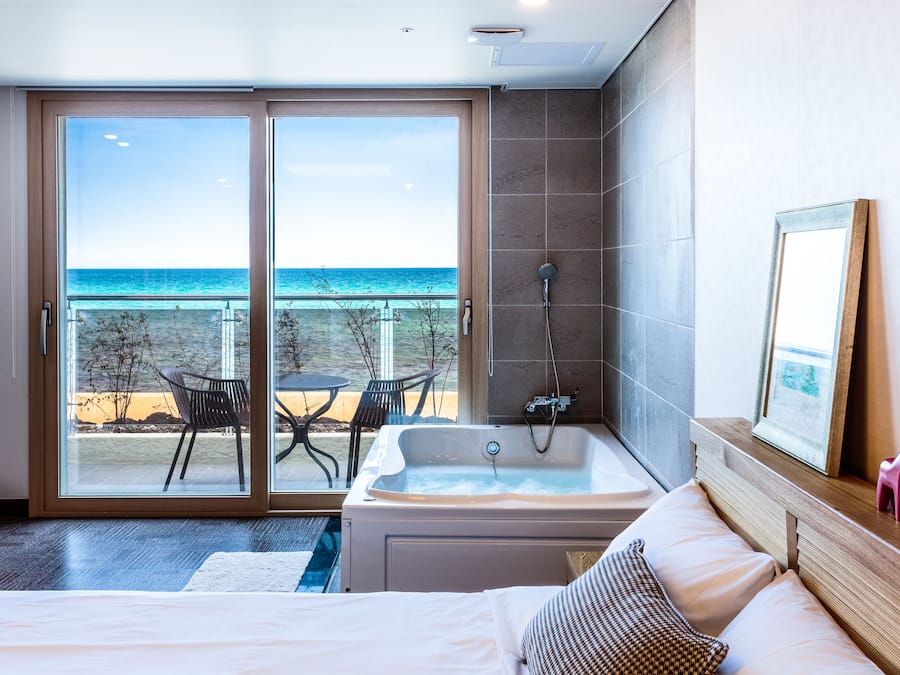 Couple Room or Emerald Room (Random Assign) | Down comforters, desk, free WiFi, bed sheets