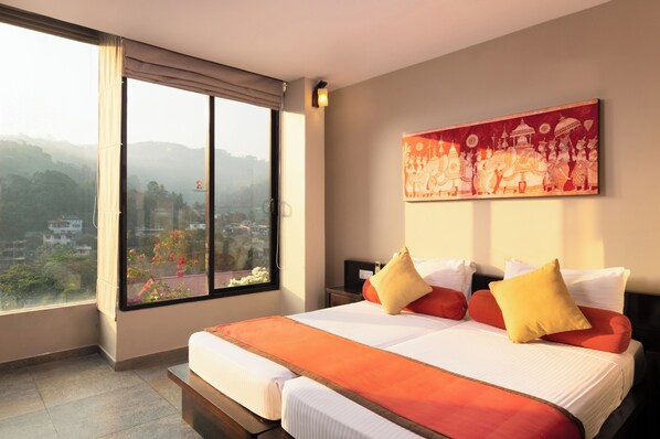 Deluxe Room | Premium bedding, in-room safe, desk, iron/ironing board