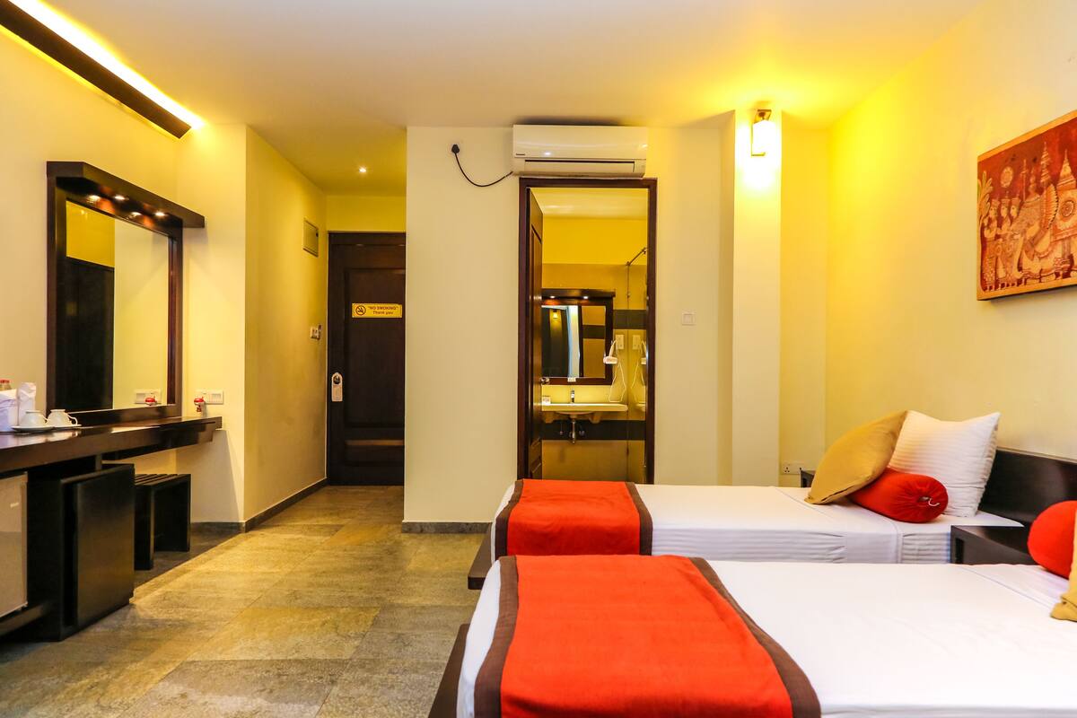 Deluxe Room | Premium bedding, in-room safe, desk, iron/ironing board