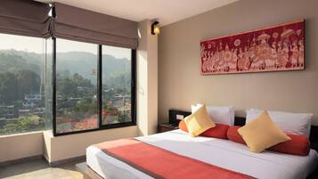 Deluxe Room | Premium bedding, in-room safe, desk, iron/ironing board
