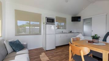 Standard Cabin - Sleeps 2 - Dog Friendly | Living area | 32-inch TV with cable channels
