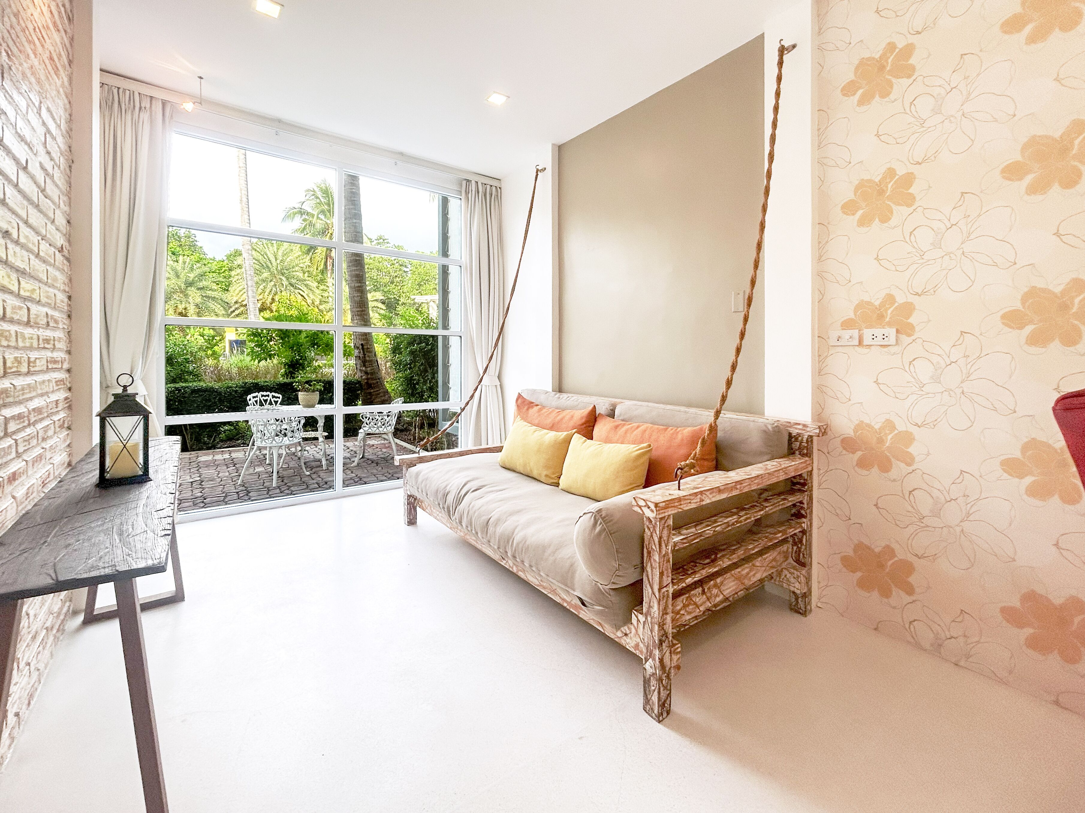 pool view suite | living area | 55-inch smart tv with digital channels, netflix, streaming services