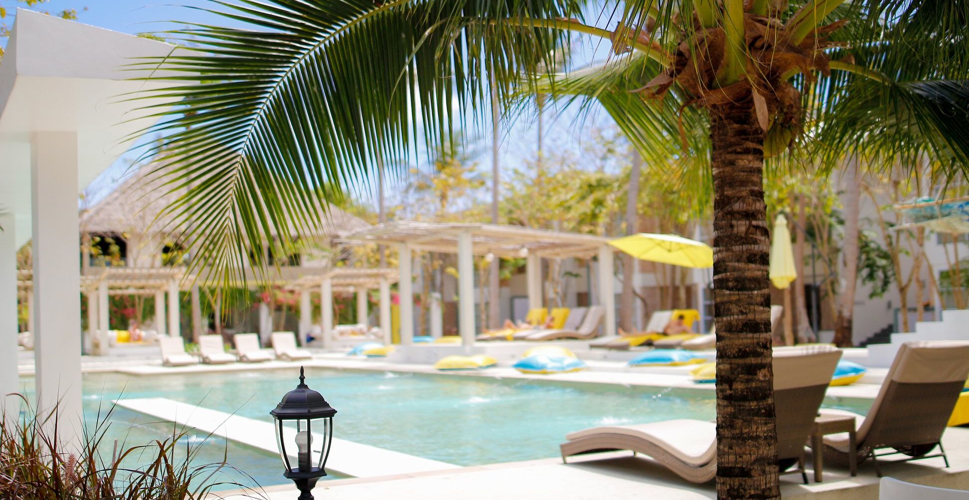 outdoor pool, pool umbrellas, pool loungers