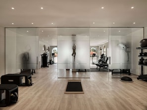 Work out in style with our comprehensive fitness center, featuring treadmills, stationary bikes, and weight machines, plus a designated area for floor exercises.