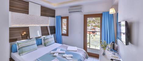 Egyptian cotton sheets, premium bedding, minibar, in-room safe