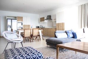 Superior Penthouse, 3 Bedrooms | Living room | Flat-screen TV