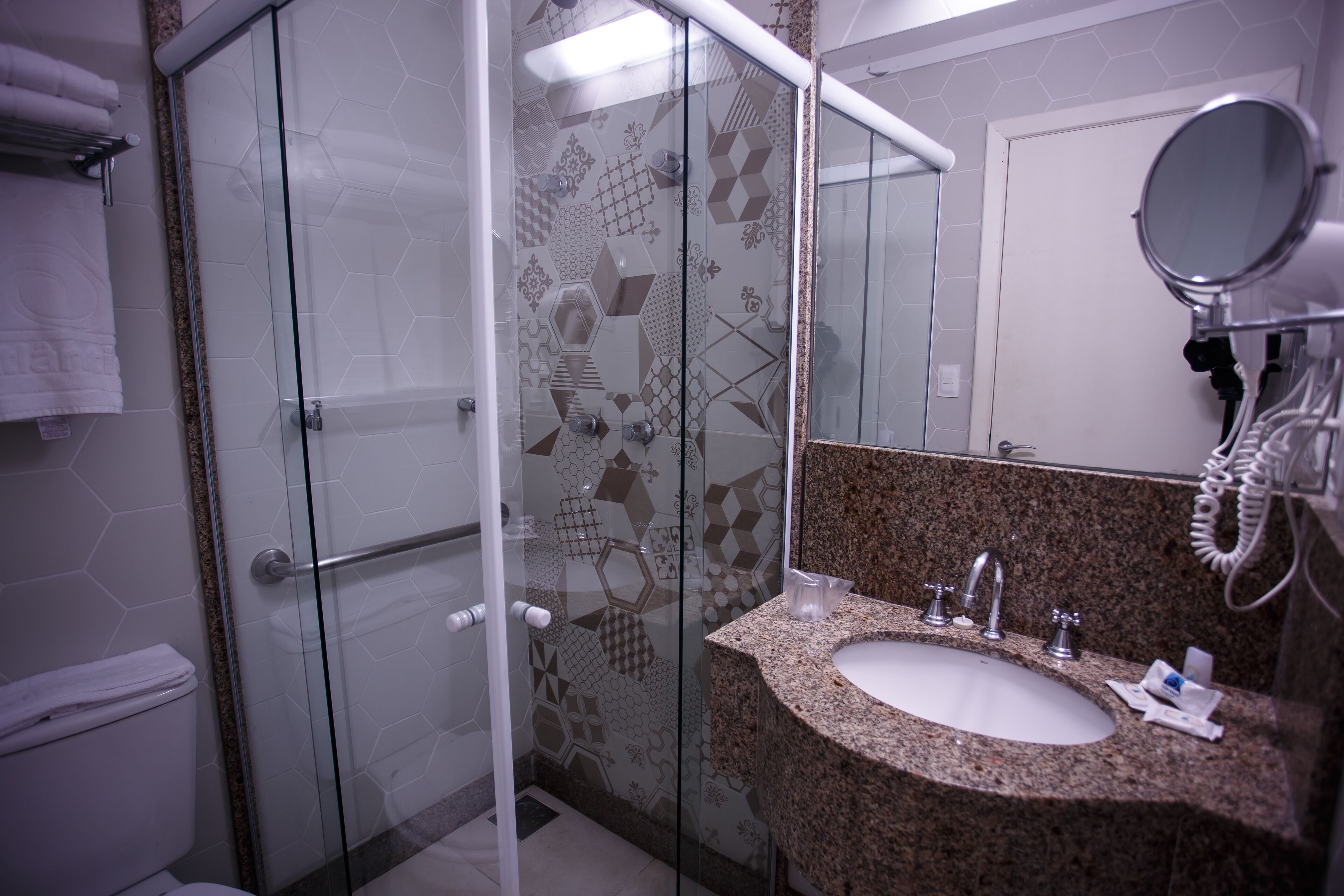 shower, towels, soap, toilet paper