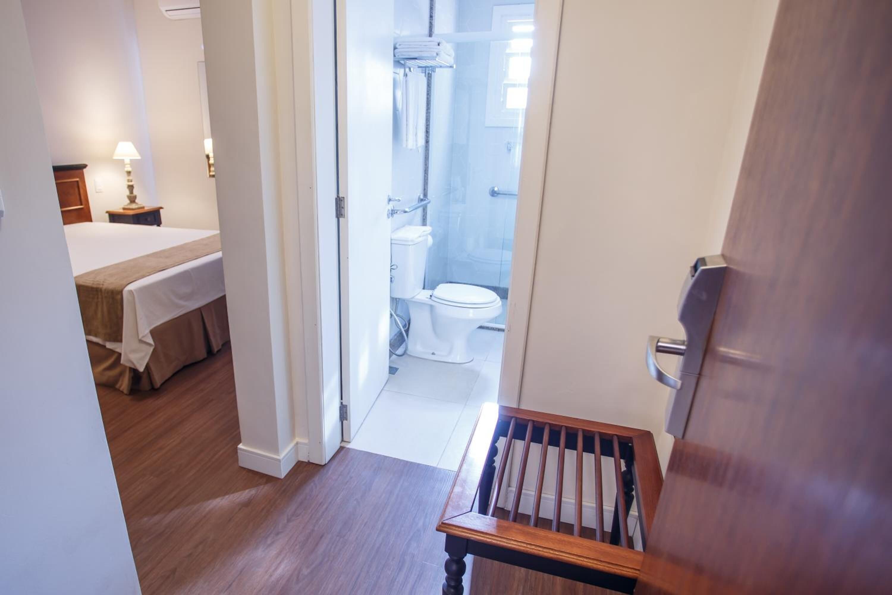 deluxe double room | minibar, desk, free cots/infant beds, rollaway beds