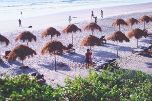 Private beach, beach umbrellas, beach towels, beach yoga