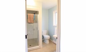 Premium Cottage, 3 Bedrooms (A Shore Thing) | Bathroom | Combined shower/tub, hair dryer, towels