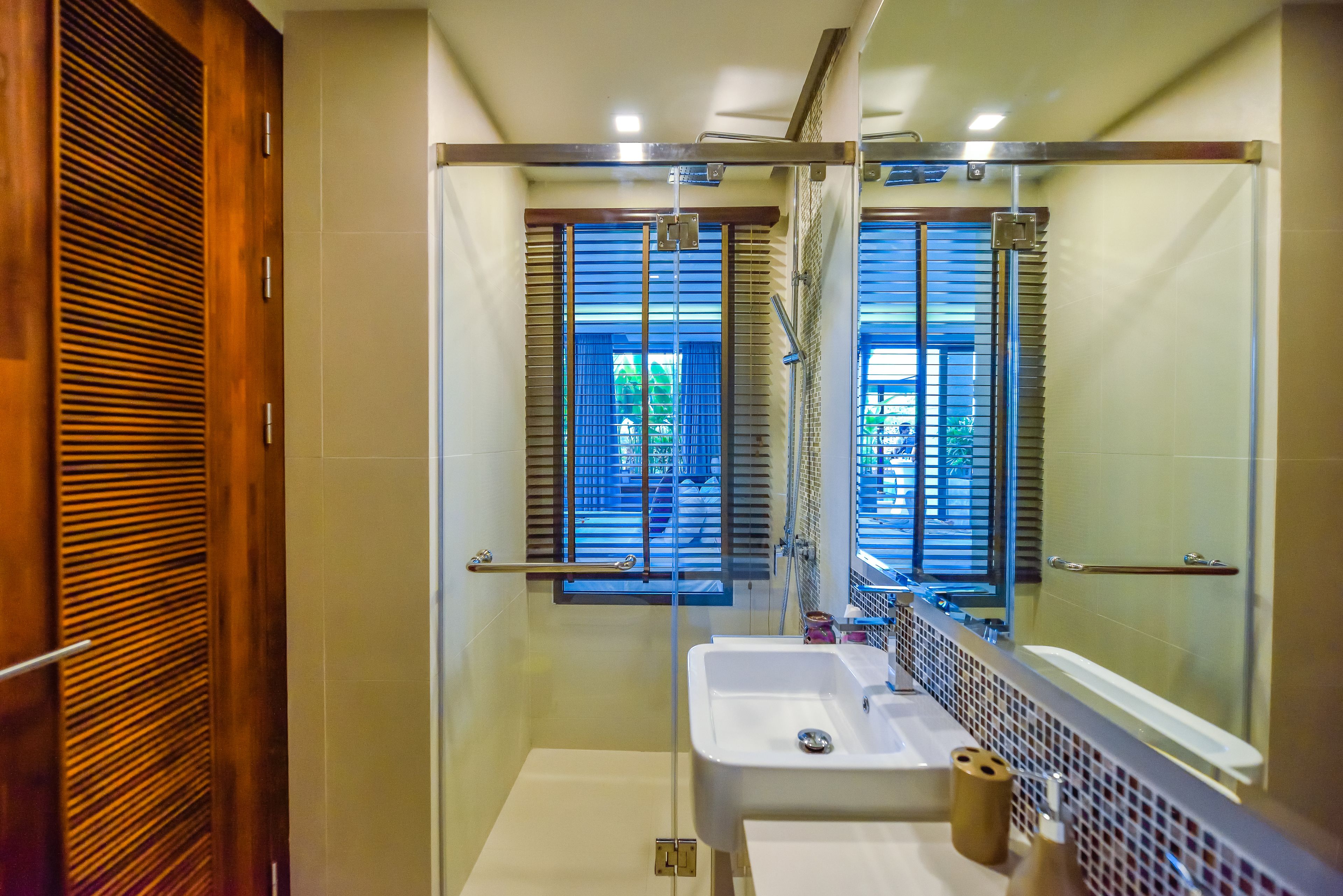 studio, pool view | bathroom | shower, free toiletries, hair dryer, towels