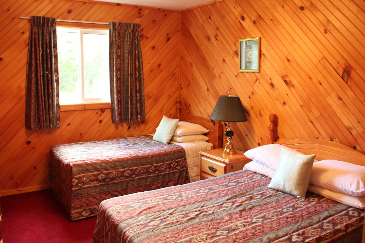 Executive Cottage | 2 bedrooms, individually decorated, individually furnished