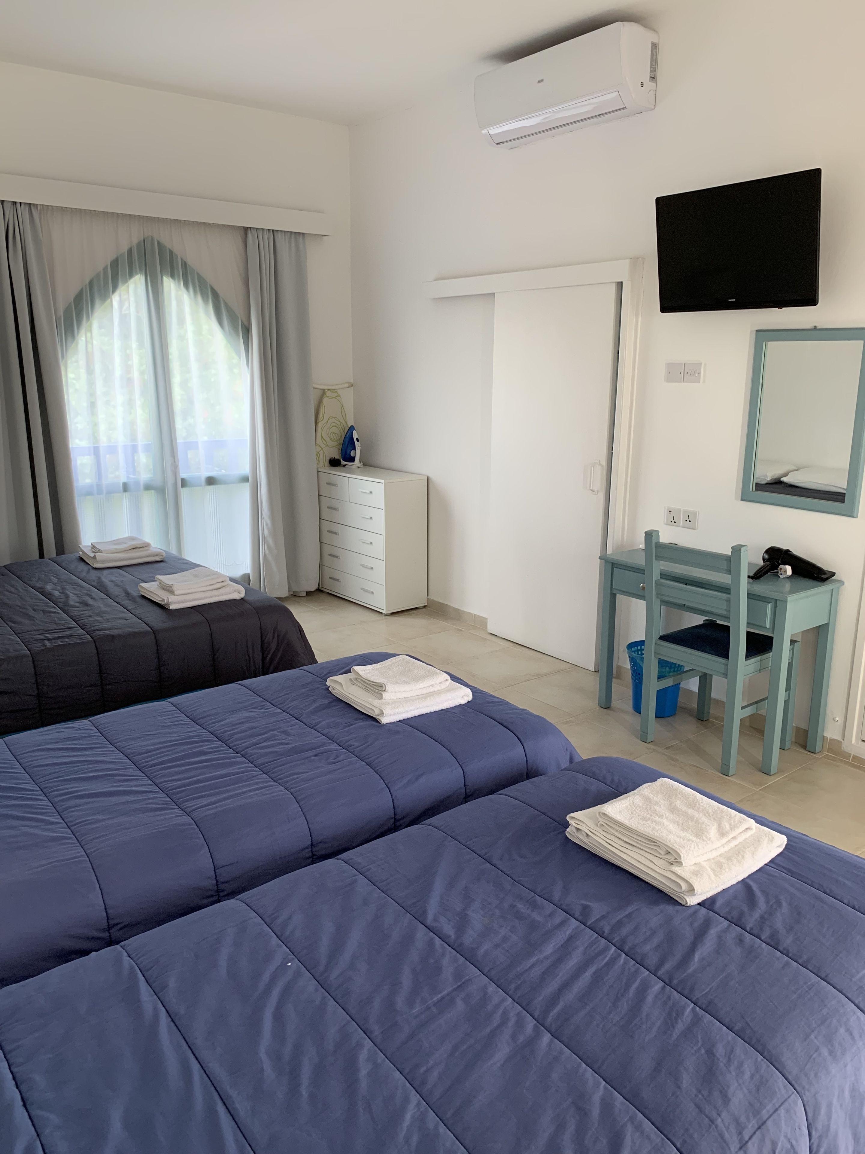 family room | desk, iron/ironing board, free wifi, bed sheets