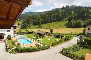 Outdoor pool, pool umbrellas, pool loungers