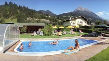 Outdoor pool, pool umbrellas, pool loungers