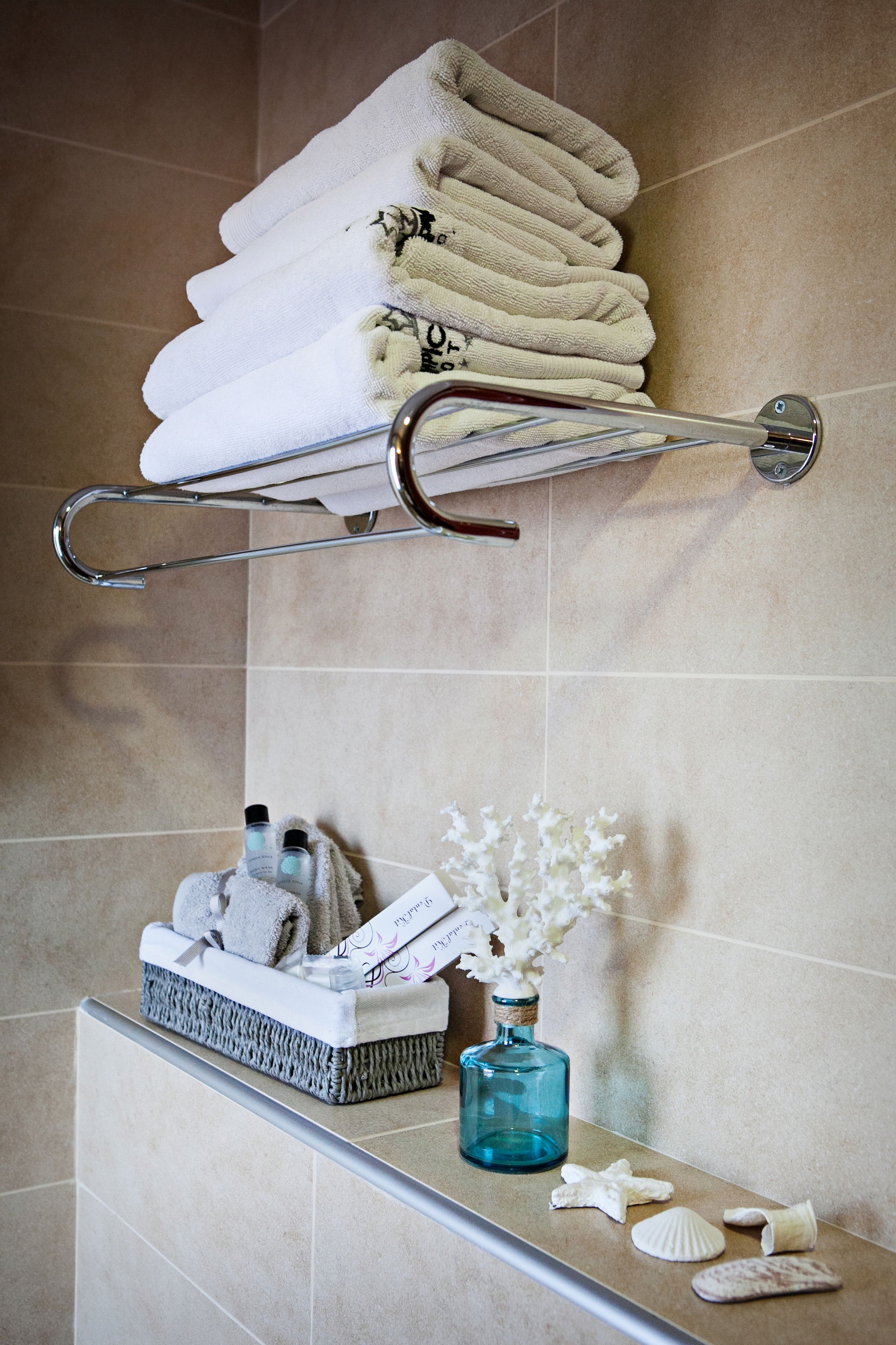 family room, sea view | bathroom amenities | shower, hair dryer, towels