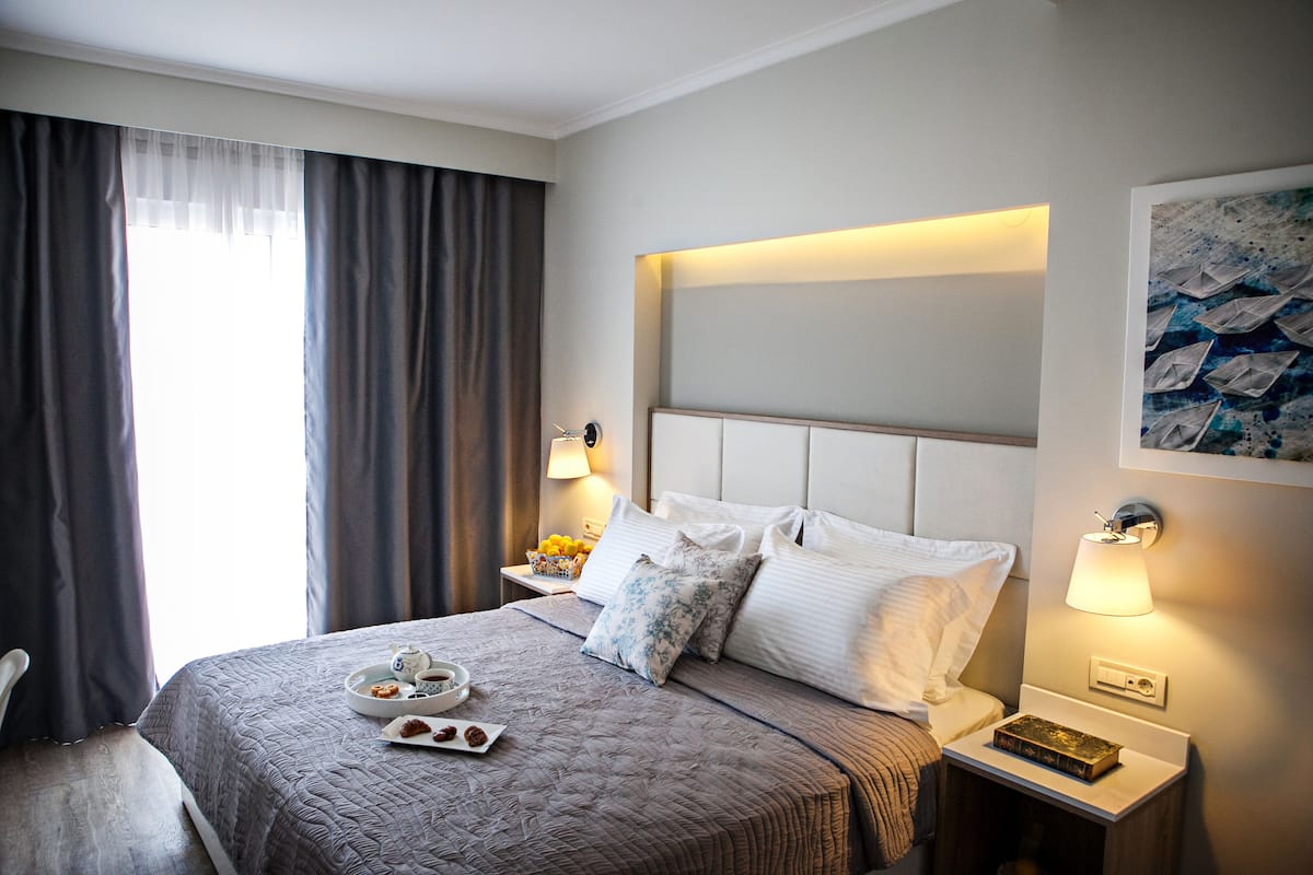 Family Room, Sea View | In-room safe, desk, laptop workspace, soundproofing