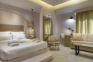 ห้องดีลักซ์, วิวทะเล | บริเวณนั่งเล่น | ทีวีจอแบน